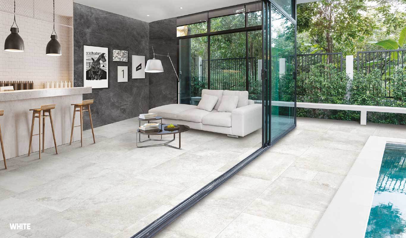 Stone-look porcelain enhances architectural interiors with luxury.