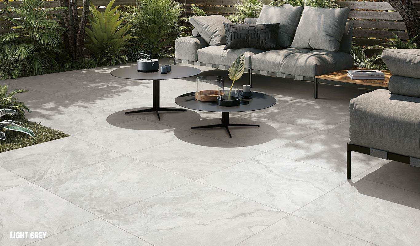 Achieve a rustic ambiance with stone-look porcelain tile flooring.